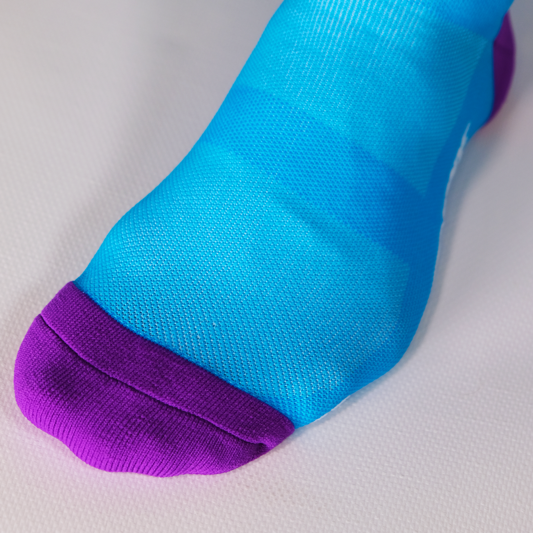 Chaussettes de cyclisme - La turquoise/violet